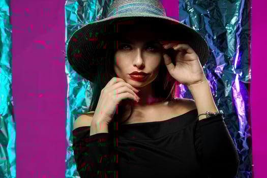 serious woman in hat with wide brim photo