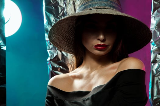 Lady with red lips in a hat photo