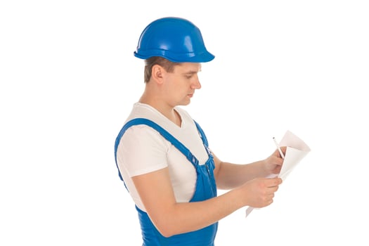 male builder with plan in his hands photo