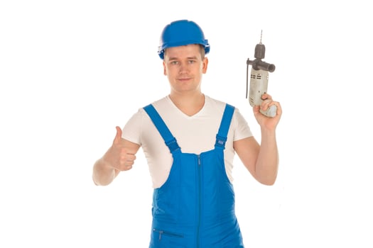 man builder with drill in hand photo