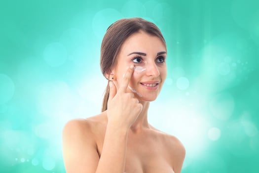 Young girl takes care her skin. photo