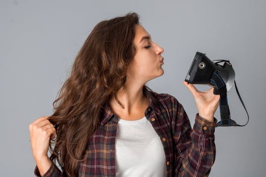stylish girl testing virtual reality glasses photo