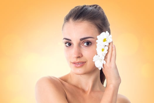 Young girl takes care her skin. photo
