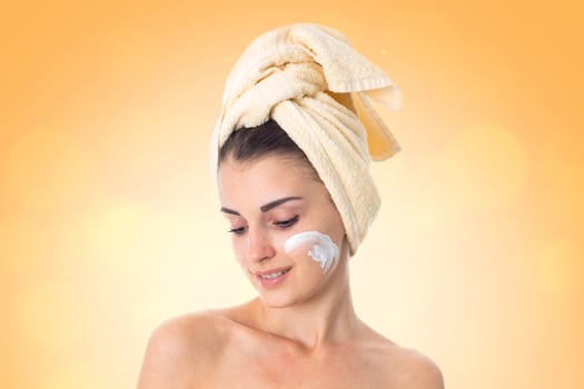 Young girl takes care her skin. photo