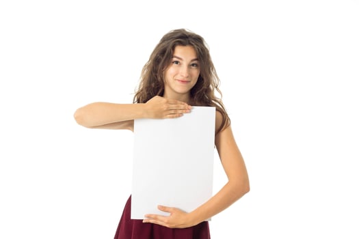 girl in red dress with white placard photo