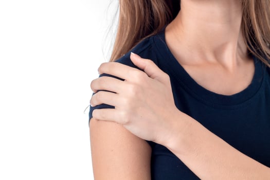 the girl in the black shirt keeps hand on the shoulder of the close-up photo