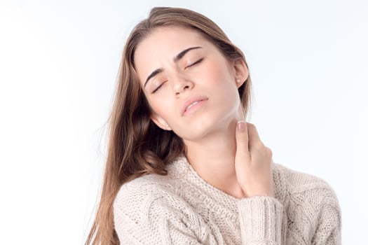 woman with a pain in the neck photo