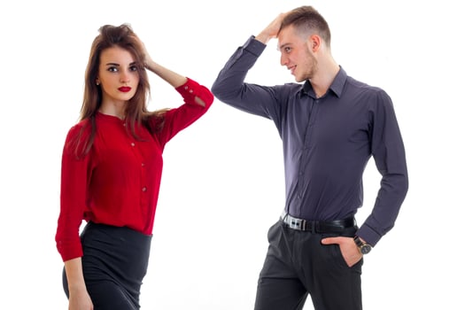 young beautiful couple in love stand opposite each other and hold hands head photo