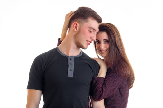 an attractive young girl with long hair is smiling and obniaet guy close-up photo