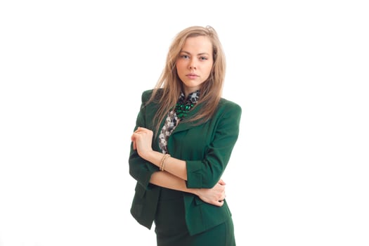 sexy young blonde stands in a beautiful suit and looking forward photo