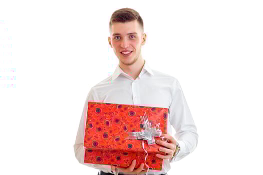 Pretty elegance man in white shirt open a gift box and smiling on camera photo