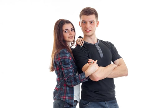 cute young couple in love hugs and smiles on camera photo