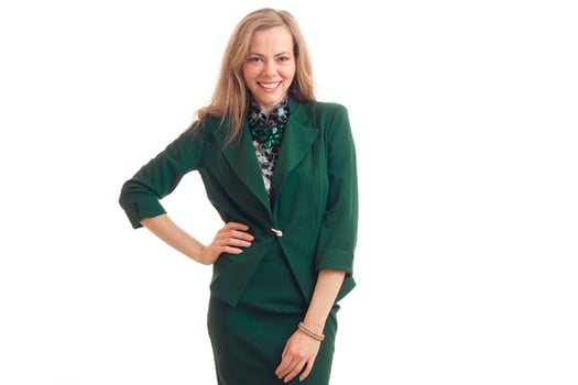 beautiful trendy blonde in green costume looks into the camera and smiling photo