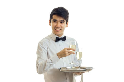 smiling awesome waiter shirt holding a glass of wine with a tray photo