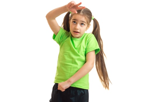 funny little girl in green shirt posing photo