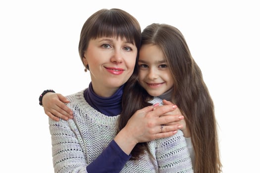 horizontal portrait of cute mom with a daughter who stare into the camera and smiling photo