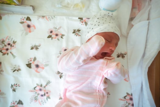 Portrait of a cute newborn girl photo
