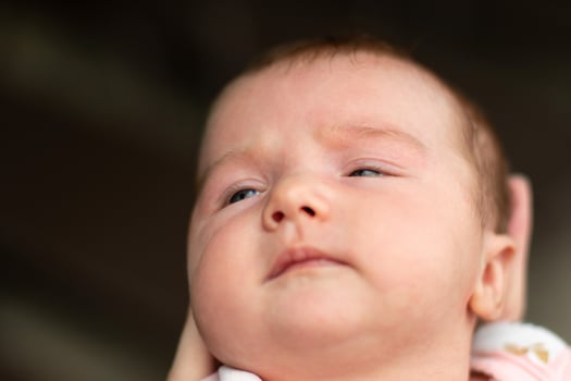closeup portrait of a beautiful little baby girl photo