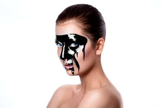 Black paint on woman's face photo