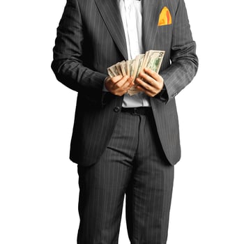 man in suit counts the money photo