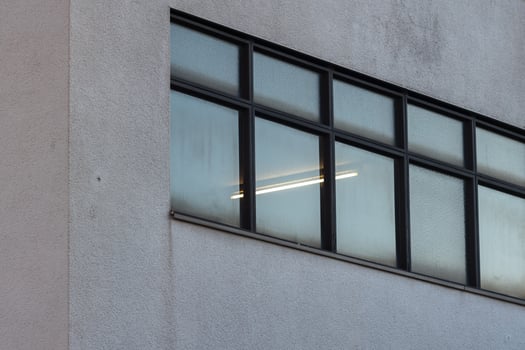 windows of a building in the city photo