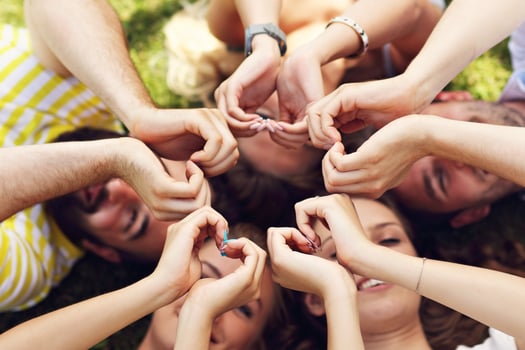 Friends group having fun together on grass photo