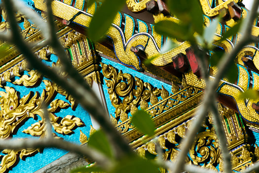 Closeup of beautiful bright decorations in ancient temple in Thailand. photo