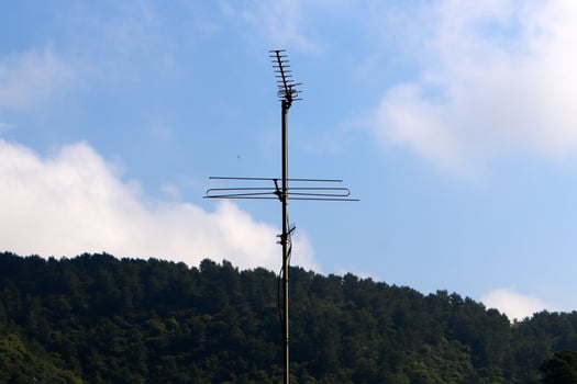 High antenna for emitting and receiving radio waves. photo