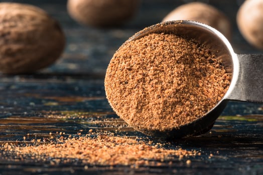 Ground Nutmeg Spilled from a Teaspoon photo