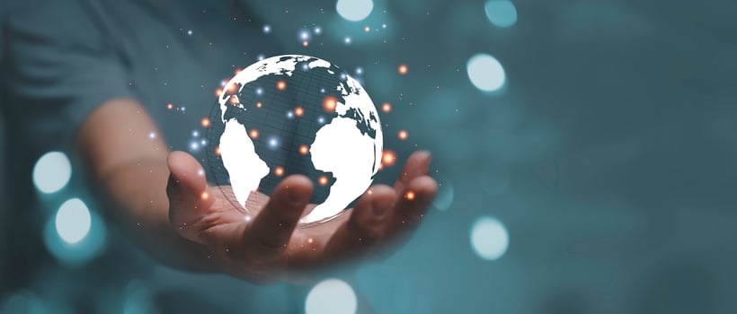 Businessman holding Global network connection. Big data analytics and business intelligence concept. World map point and line composition concept of global business. Digital link technology. photo