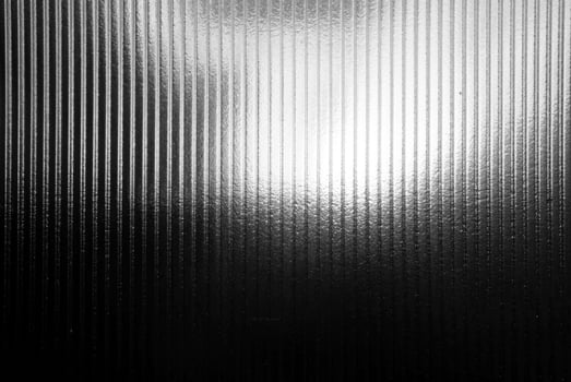 Black Vertical Glass Striped Wall Background. photo