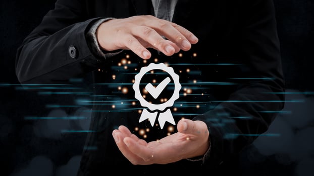 person's hand holding and show the sign of the top service  best quality, ISO certification, Standards, Guarantee, and standardization concept. photo