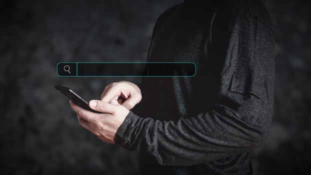 businessman uses a smartphone analysis ranking traffic website. Searching Browsing Internet Data Information with blank search bar.  . Search Engine Optimization SEO Networking Concept. photo
