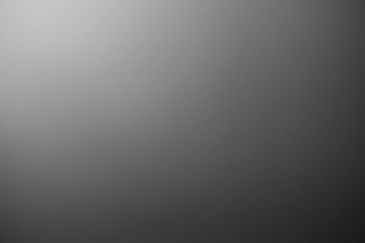 Dark black and gray blurred gradient background has a little abstract light. soft background for wallpaper,design,graphic and presentation, backdrop wall photo