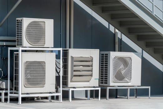 Air compressor on rooftop building photo