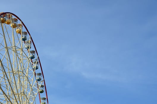 Entertainment Ferris wheel against the clear blue sky photo