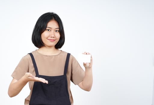 Holding and Showing Blank Credit Card Of Beautiful Asian Woman Isolated On White Background photo