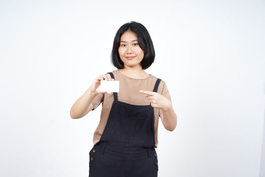 Holding and Showing Blank Credit Card Of Beautiful Asian Woman Isolated On White Background photo