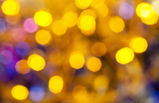 yellow blue blurred shimmering Christmas lights photo