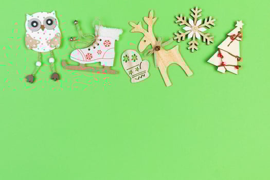 Top view of holiday ornament made of Christmas decorations on colorful background. New Year time concept with copy space photo
