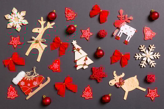 Christmas black background with holiday toys and decorations. Happy New Year concept photo