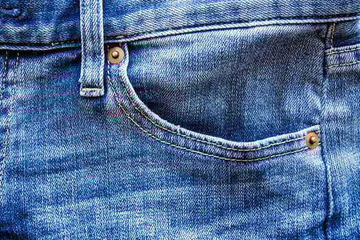 Pocket of denim blue jean photo