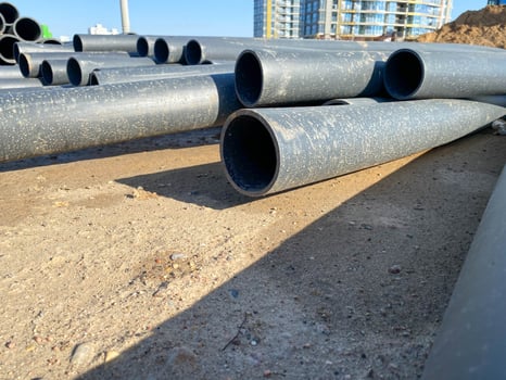 Modern polypropylene pipes for conducting heating mains underground. Durable and anticorrosive properties of water pipes, drainage system photo