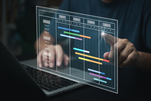 Project manager analyst working with computer in management system to progress planning and make report with KPI chart scheduling diagram.Corporate strategy for finance, sales, marketing. photo