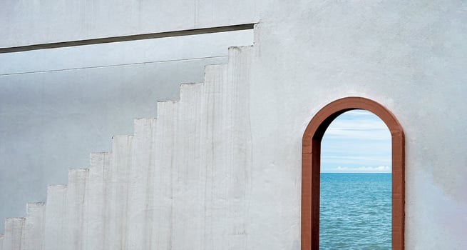 Cement wall and Step Stair with Wooden Window Frame, Architecture Loft Building Grey Concrete Wall Background with Tuscany Arches Brown Wood Door view through Seascape and Blue sky, Minimal concept photo