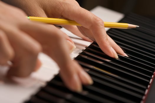 Woman's Fingers on Digital Piano Keys photo