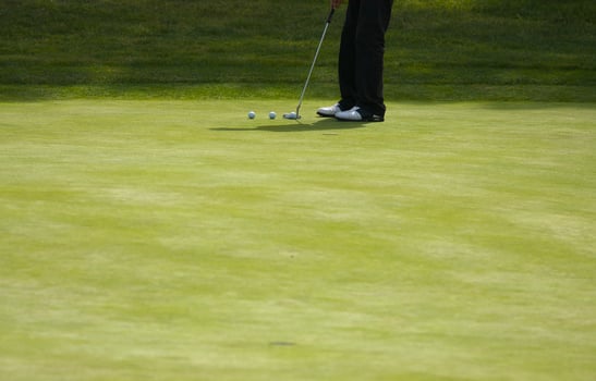 Golf Putting on the Green photo