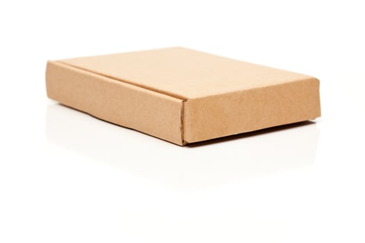 Closed Thin Cardboard Box on White photo