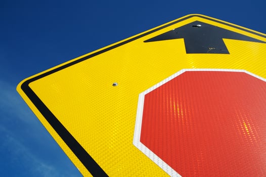 Stop Ahead Road Sign on Blue Sky photo