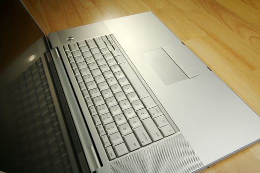 Angled Laptop Image on Desk photo